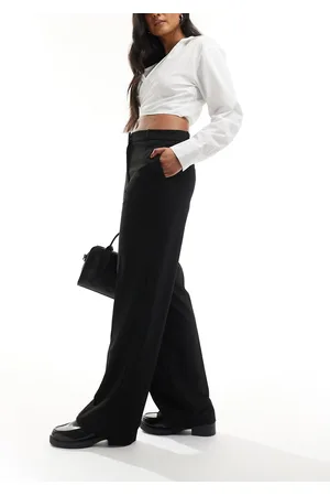 MANGO Pantalones negros de corte sartorial holgado y pernera recta de