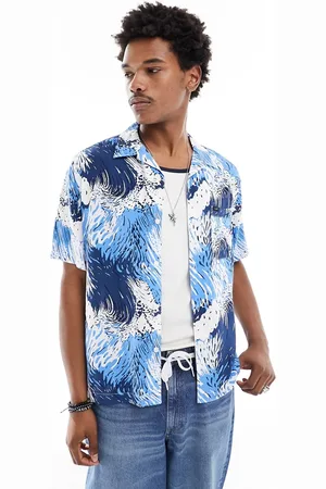 Lee Camisa resort holgada de manga corta con cuello de solapas y estampado de olas de