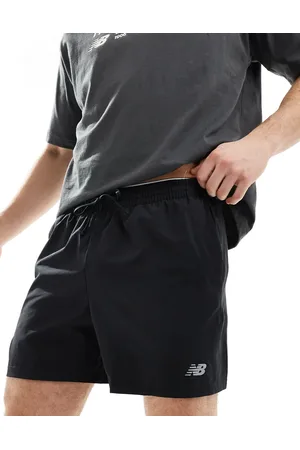 New Balance Pantalones cortos deportivos de 5" negros de
