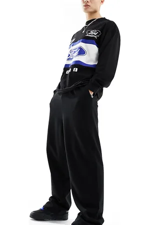COLLUSION Joggers negros de