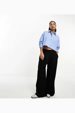 ASOS Pantalones negros de pernera ancha con parte delantera depurada de ASOS DESIGN Petite