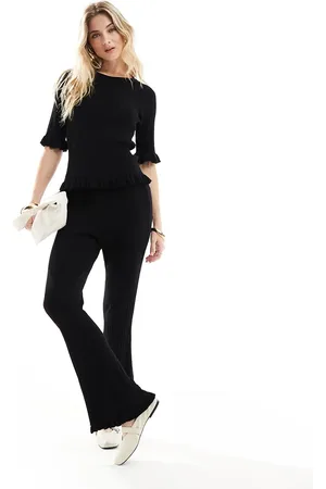 VERO MODA Pantalones de campana negros con bordes ondulados de punto Aware de (parte de un conjunto)