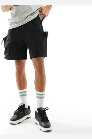 ADPT. Pantalones cortos negros cargo técnicos de