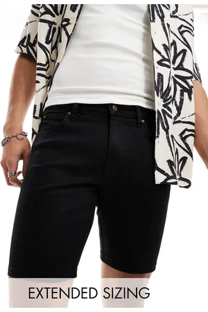ASOS Pantalones cortos vaqueros negros entallados de largo estándar de