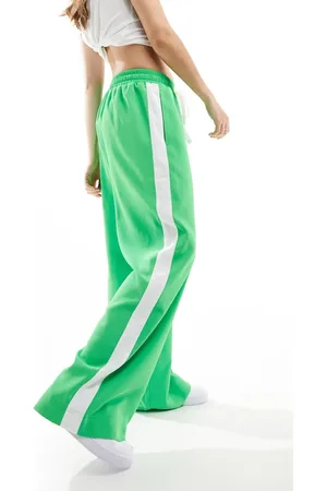 ASOS Pantalones verde luminoso sin cierres con panel en contraste de