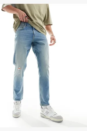 ASOS Vaqueros de corte slim elástico con y detalle de abrasiones de