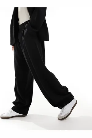 ASOS Pantalones de traje negros de línea sartorial casual y corte ancho de sirsaca de