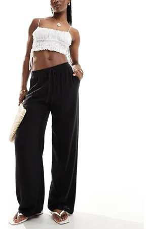 VILA Pantalones negros de pernera ancha con lazada en la cintura de tacto efecto lino de