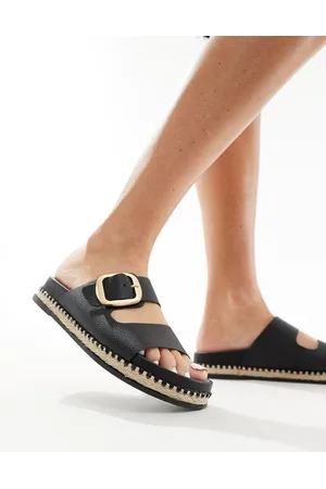 Schuh Sandalias negras estilo alpargatas de cuero con dos correas y hebilla Tish de