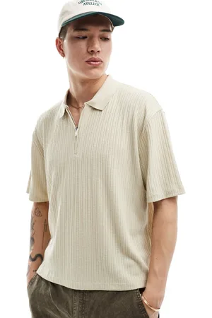 ASOS Polo color piedra holgado con solapas y cremallera de canalé de -Beis neutro