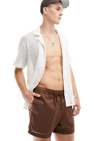ASOS Shorts de baño cortos marrones con detalles en los bajos de
