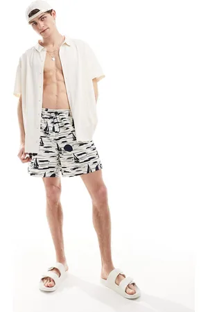 Hunky Trunks Shorts de baño blanco hueso con estampado de barcos y puesta de sol de - neutro
