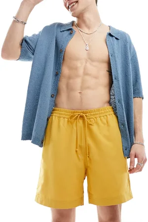Carhartt Shorts de baño amarillos Chase de