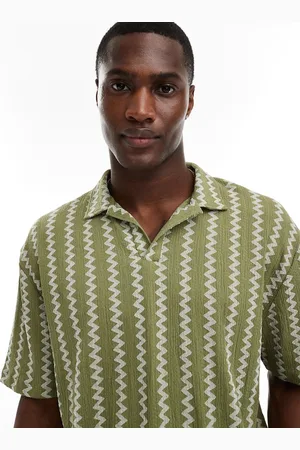 ASOS Polo holgado con cuello de solapas y patrón en zigzag texturizado de -Verde
