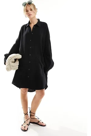 ASOS Vestido camisero extragrande con bolsillos caídos de tejido doble de