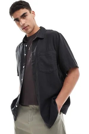 Weekday Camisa negra holgada de manga corta de mezcla de lino de