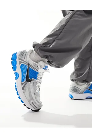 Nike Zapatillas de deporte blancas y azules Zoom Vomero 5 de