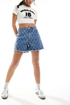 VILA Pantalones cortos vaqueros azules con lavado medio y diseño deshilachado de