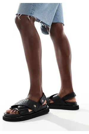 River Island Sandalias negras con correas cruzadas y diseño en relieve de
