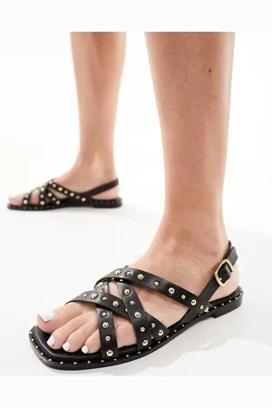 Schuh Sandalias negras de cuero con tira talonera y detalle de tachuelas Thelma de