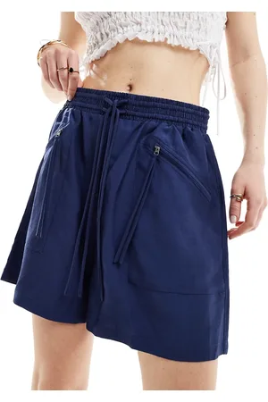 & OTHER STORIES Pantalones cortos azules con cintura elástica y bolsillos con cremallera de tejido supersuave de