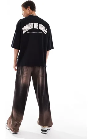 Dr Denim Camiseta negra extragrande con estampado gráfico rosa en la espalda "Around the World" Curtis de