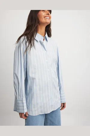 NA-KD Camisa azul a rayas blancas extragrande con puños anchos de x Laura Jane Stone