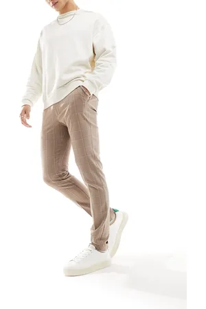 ASOS Pantalones de vestir color de corte pitillo con estampado de cuadrícula de -Beis neutro