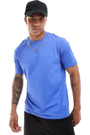Champion Camiseta azul con logo en el mismo tono en la parte central del pecho de