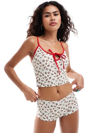 Reclaimed Top de bikini de tirantes de corte alargado con estampado floral de