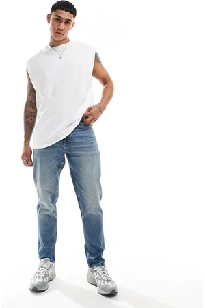 ASOS Vaqueros tapered azul claro lavado de corte elástico de