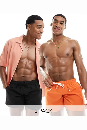 Cotton On Pack de 2 shorts de baño de color naranja y negro holgados con forro de Cotton On-Multicolor