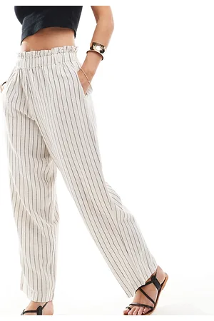 VILA Pantalones color crema de pernera ancha con raya diplomática de tejido efecto lino de -Blanco