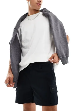 ASOS Pantalones cortos cargo negros de corte slim con detalle de parche de