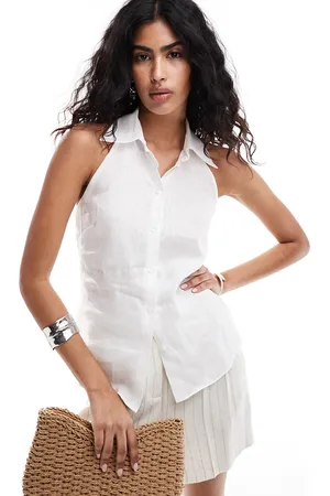 MANGO Camisa blanca con cuello halter de lino Selection de