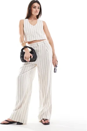 MANGO Pantalones blancos a rayas de mezcla de lino de (parte de un conjunto)