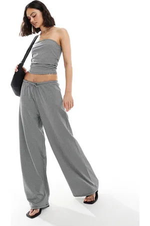 ONLY Pantalones negros y blancos a rayas de pernera muy ancha de (parte de un conjunto)