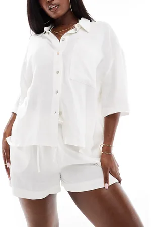 Aria Cove Camisa playera blanca de mezcla de lino de (parte de un conjunto)