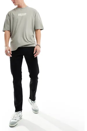 New Look Vaqueros slim en desgastado de