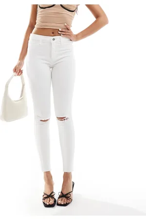 River Island Vaqueros blancos de corte pitillo y talle medio de