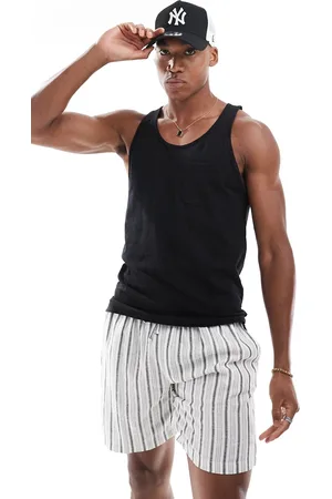 JACK & JONES Camiseta negra de tirantes con bolsillo de