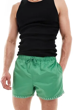 ASOS Shorts de baño cortos verdes con detalle en el bajo de