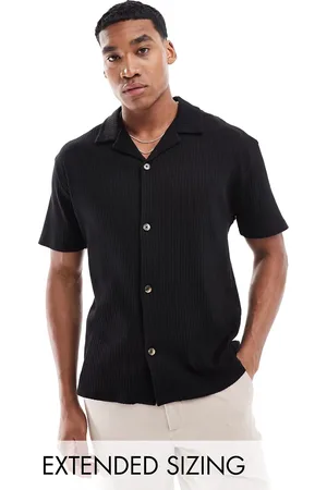 ASOS Polo holgado de canalé de