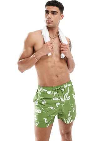 ASOS Shorts de baño cortos verdes con estampado floral de