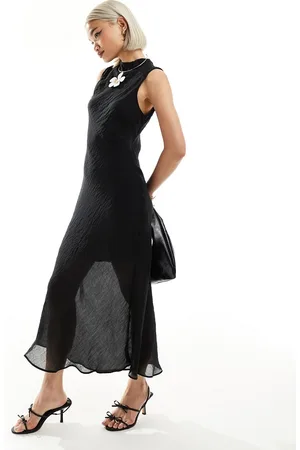 MANGO Vestido midi con bajo transparente de