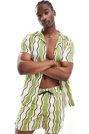 Hunky Trunks Camisa playera verde y blanca con estampado a rayas onduladas de (parte de un conjunto)