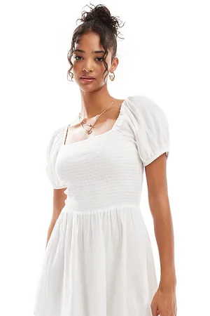 Esmée Vestido playero corto con mangas abullonadas de