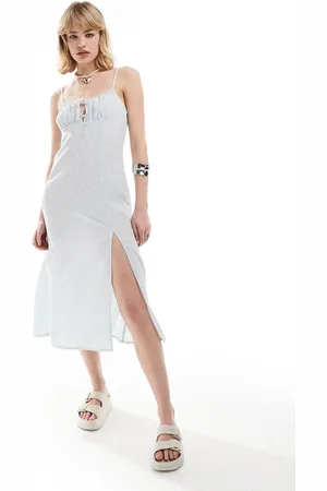 Monki Vestido midi azul de tirantes con estampado de florecitas y abertura de
