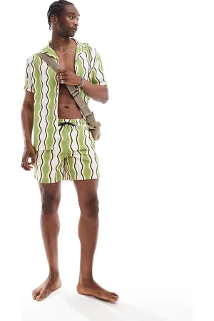 Hunky Trunks Shorts de baño verdes y blancos con estampado a rayas onduladas de (parte de un conjunto)