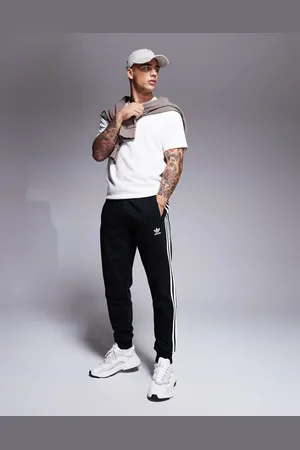 adidas Joggers con tres rayas en de
